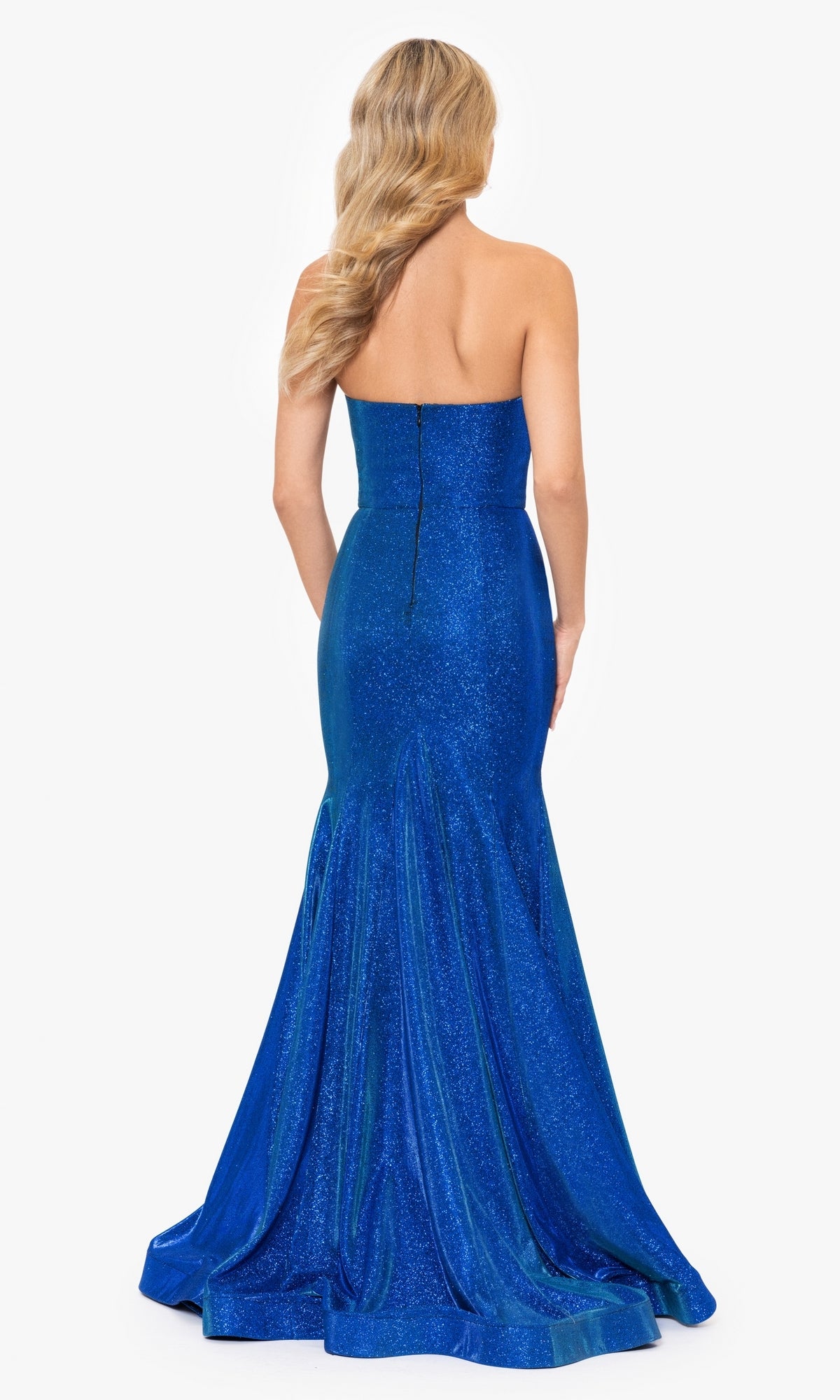 A woman with long wavy blonde hair is shown from the back wearing the Strapless Long Blue Mermaid Prom Dress 4720BN made from shimmer fabric.